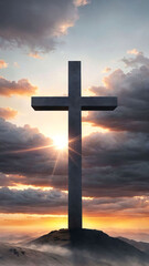 Cross on the top of the mountain in the rays of the rising sun