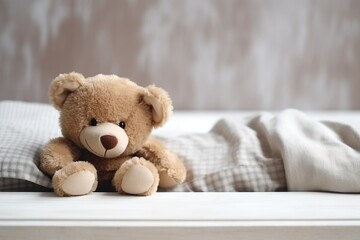 teddy bear lying on a childs empty bed