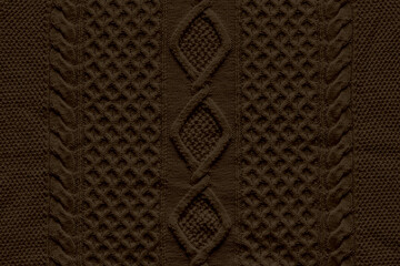 Aran sweater fabric texture background.