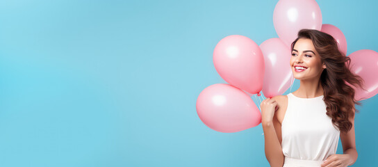 Fototapeta na wymiar Happy young woman in pretty dress with helium balloons isolated on flat blue Background with copy space, party banner template. .