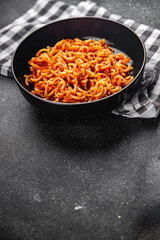 bolognese pasta sedanini rigati tomato sauce healthy eating cooking appetizer meal food snack on the table copy space