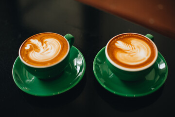 Drink hot coffee in a green mug