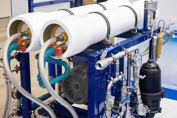 Industrial filtration equipment. Process of water desalination. Production machine with cylinders...