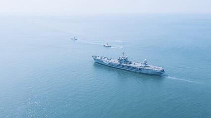 Amphibious Assault Ship. Navy aircraft carrier Aerial top view of battleship, Military sea...
