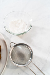 Lemon blueberry bundt cake with powdered sugar dusting