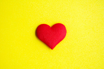 Heart shape on yellow background cover with customizable space for text or message. Love concept and copy space