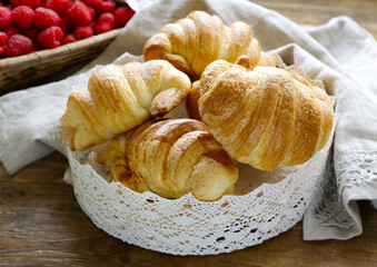 fresh baked goods croissants in a basket