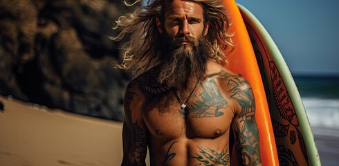 male surfer beach enthusiast poses with surfboard
