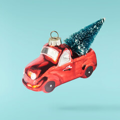 Christmas card. Falling in the air Christmas figurine.