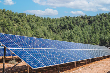 Solar panels on a mountain. A view of the solar panel with the mountains in the background,Solar...