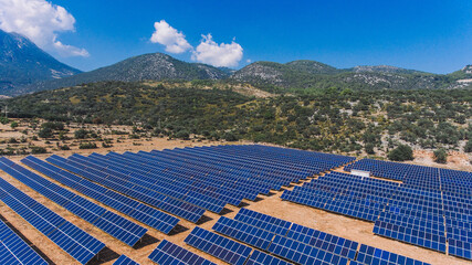 Solar panels on a mountain. A view of the solar panel with the mountains in the background,Solar...