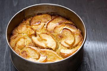 rustic apple cake in baking tin