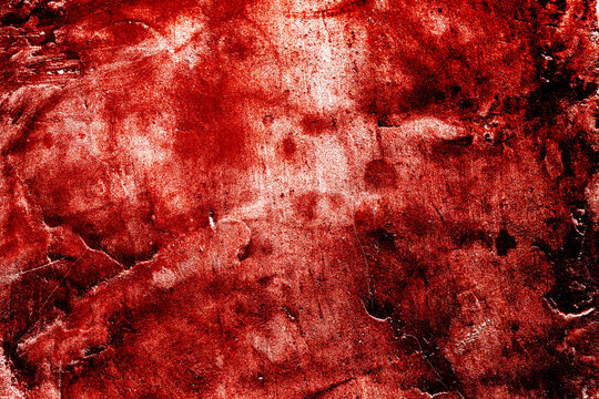Red paint on concrete wall. Red blood on old wall for halloween concept. Red and black horror background. Grunge scary red concrete
