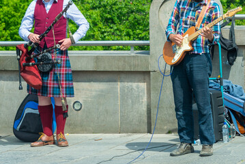 music Players along the Edinburgh street, Scotland