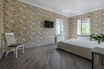 Bedroom interior with open window and blue bedside tables