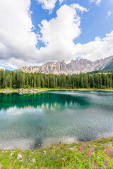 Carezza lake on a sunny day, Italy. - 655328337