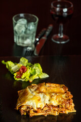 lasagna on black slate