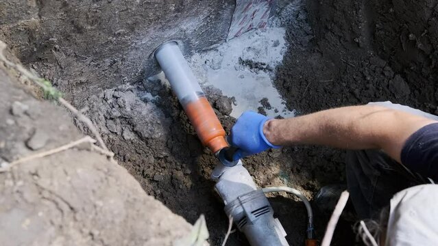 Close up footage of Diamond drilling machine hole in the concrete in home. Slow motion shot
