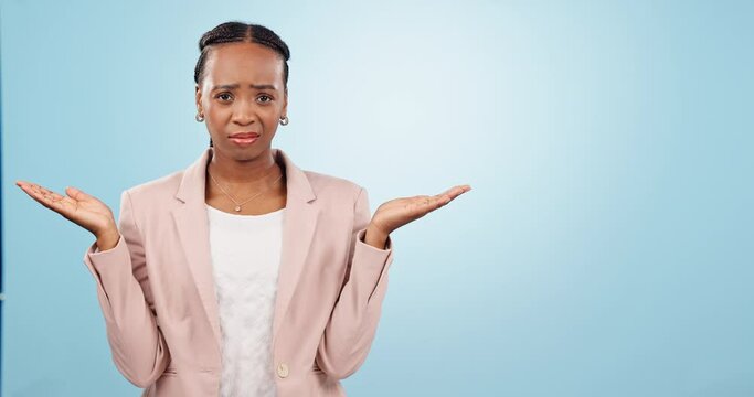 Confused, face and black woman with why hands in studio for choice, mistake or dont know on blue background. Decision, doubt and portrait of African female model with palm scale emoji, guess or shrug