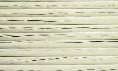 A wooden wall made of light beams. Wood texture. Wood is ecological and stylish. Dry wood.