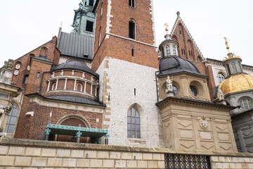 Royal Wawel royal castle in Krakow in rainy early spring weather in Poland. historic castle in the old city Gardens and cathedra, Cracow, Poland. Travel attraction tourist destination