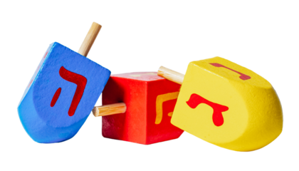 Wooden dreidels for Hanukkah isolated on white or transparent background.