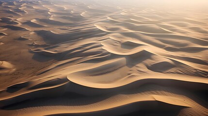 Fototapeta na wymiar Beautiful panoramic view of golden sand dunes at sunset