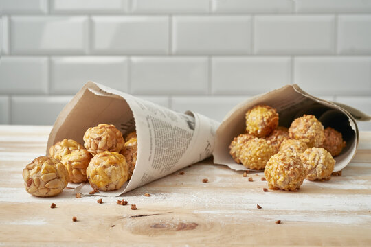 Panellets in newsprint cones