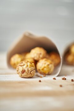 Panellets in newsprint cones