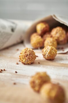 Panellets in newsprint cones