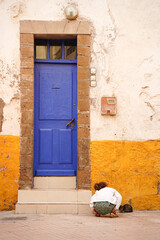 old blue door with kid