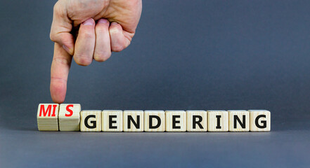 Gendering or misgendering symbol. Concept words Gendering Misgendering on wooden blocks. Beautiful...