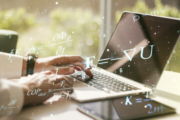 Creative scientific formula illustration with hands typing on computer keyboard on background,...