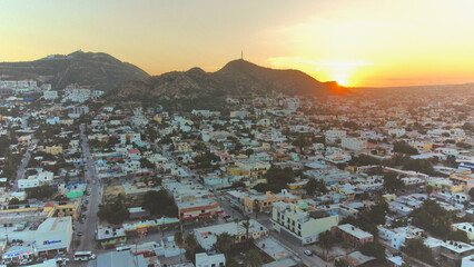 Fototapeta premium Aerial view of a sunset over the city
