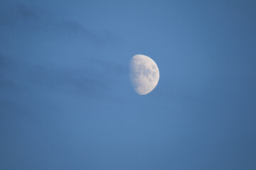 Waxing Moon in the Blue Afternoon Sky
