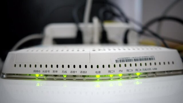 White chinese modem with green neon lights working