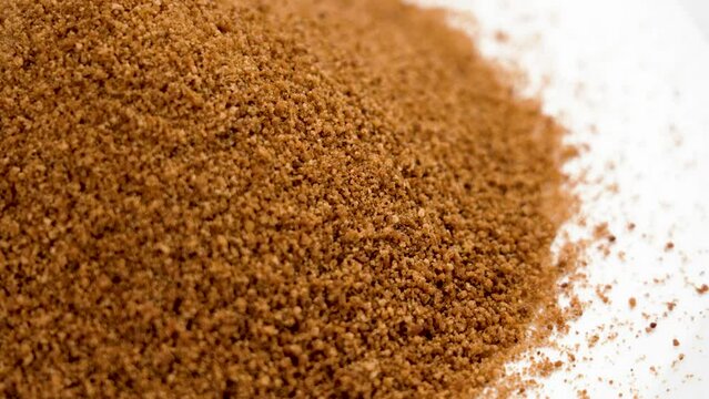 Coconut brown unrefined sugar close up. Rotation