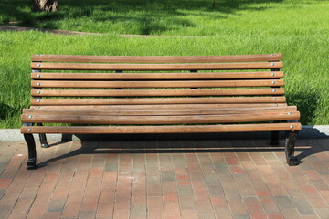 beautiful bench in city park. Summer park with place for rest