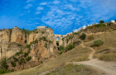 Panoramic view of Puente Nuevo Bridge at sunset in Ronda, Spain