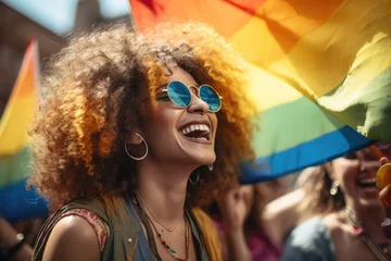 Foto op Plexiglas Woman with curly hair proudly holds vibrant rainbow flag, symbolizing support and solidarity for LGBTQ community. Diversity, equality, and inclusivity in various contexts © vefimov
