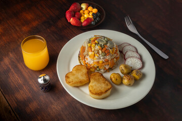 Rice with vegetables - potatoes - and orange juice 