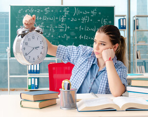 Female student sitting in the classroom