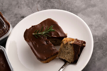 Fototapeta na wymiar Chocolate banana cake on a white plate