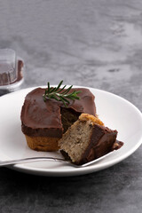 Chocolate banana cake on a white plate