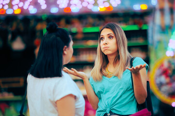 Women Arguing over a Misunderstanding on the Street. Girl apologizing for wrongdoing to her best...