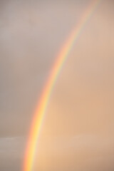 Rainbow during evening sunset. Nature sky frame