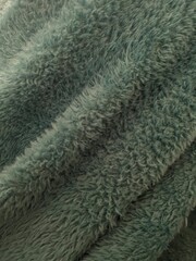 Closeup of soft green fabric