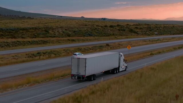 Sunset Drive: Semi Truck in Desert Steppe Stars Moving.