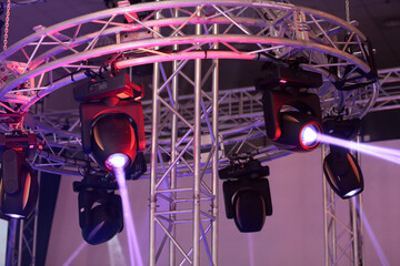 LED stage lighting moving heads hanging on truss