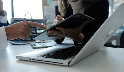 Team of business people are meeting to analyze data for marketing plan,Market research reports and income statistics, Financial and Accounting concept.